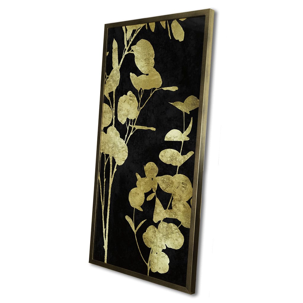 Decorative wall art with gold floral design on a black background