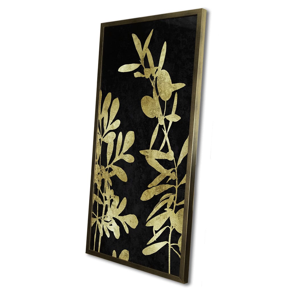 Decorative wall art with gold leaf design on a black background