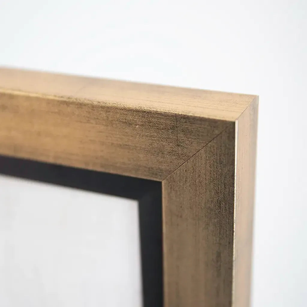 frame close up on luxury abstract circular wall art featuring gold, black and brown sweeping brushstrokes in a modern Bedroom. Hand made by Elysian Bespoke.