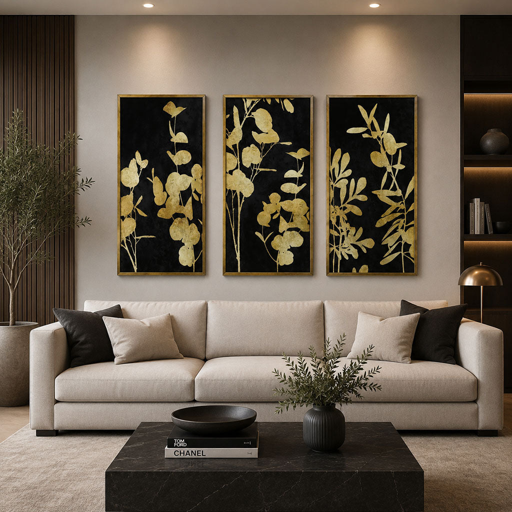 Modern living room with a beige sofa, decorative plants, and wall art.