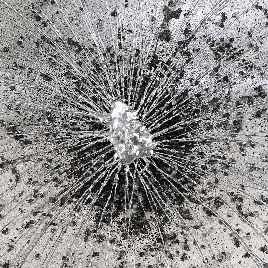 close up detail of large metal abstract wall art in black and silver. Hand made by paul marshall at elysian bespoke
