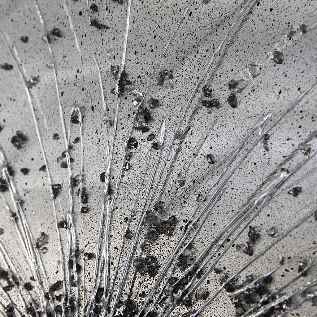 super close up detail of large metal abstract wall art in black and silver. Hand made by paul marshall at elysian bespoke