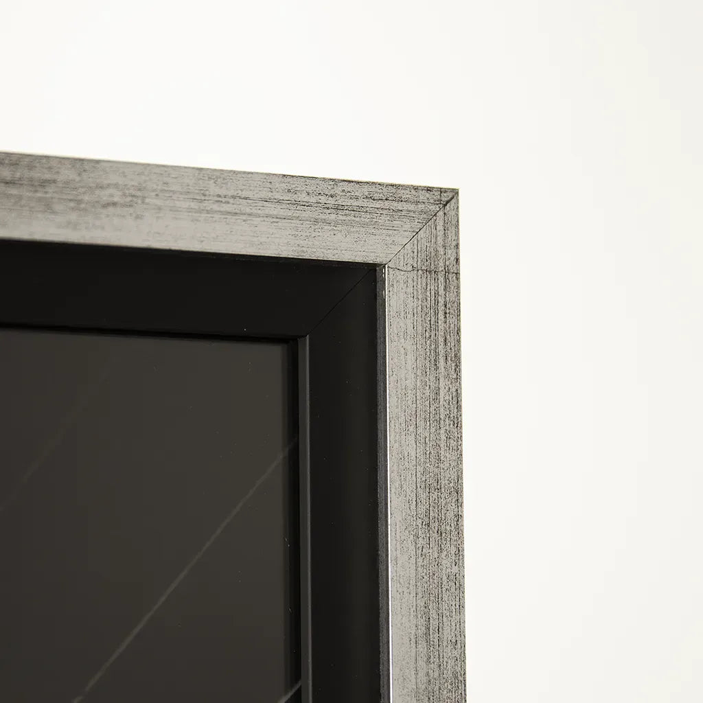 closeup of the frame on Handmade wooden framed black and white wall art featuring London's St Paul's Cathedral and Millennium Bridge by Elysian Bespoke, luxury contemporary statement artwork for modern interiors.