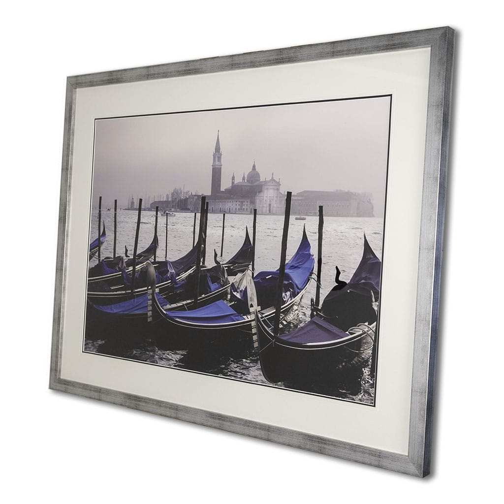 side view of large luxury framed wall art of venice with gondolas. Framed in a modern silver handmade by elysian bespoke.