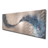 large blue metal wall art in a wave design