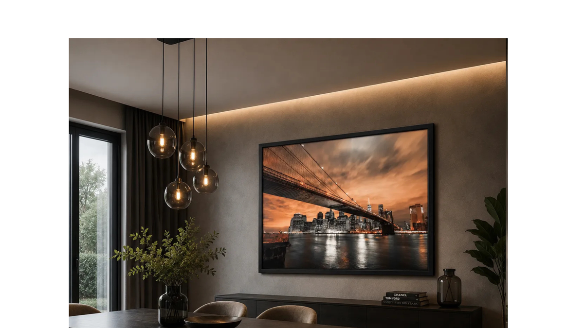 Contemporary New York skyline wall art displayed above a modern living room sofa.