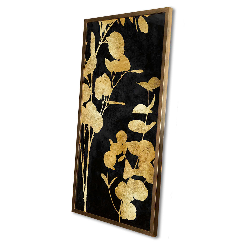 Decorative wall art with gold floral design on a black background