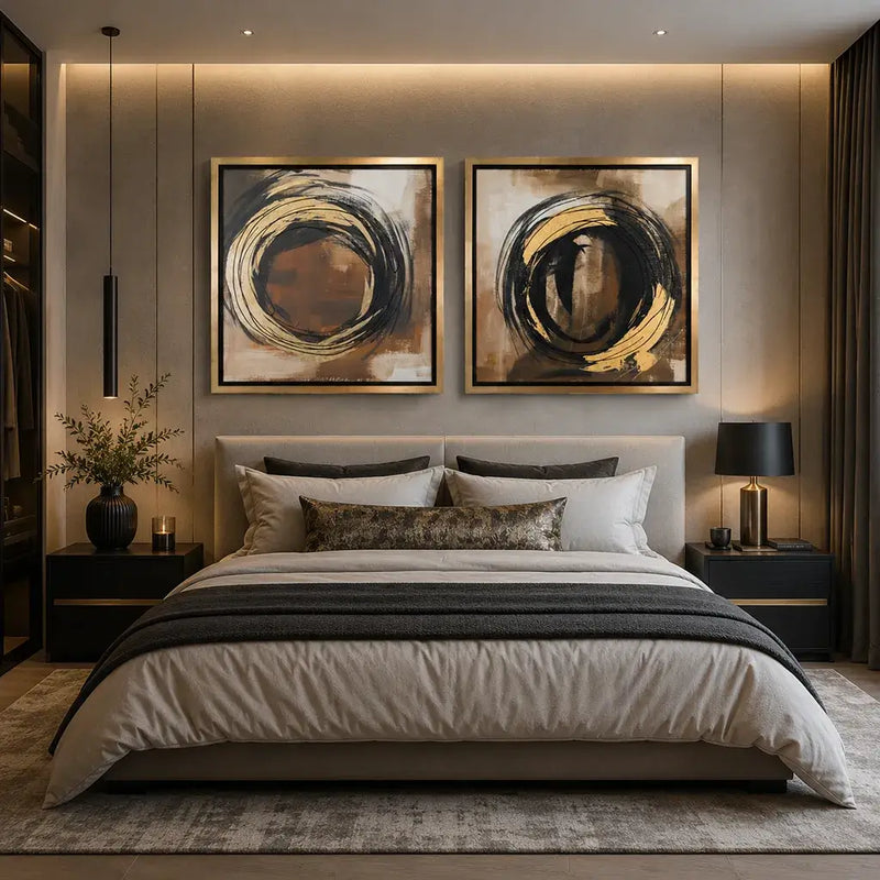 luxury abstract circular wall art featuring gold, black and brown sweeping brushstrokes in a modern Bedroom. Hand made by Elysian Bespoke.