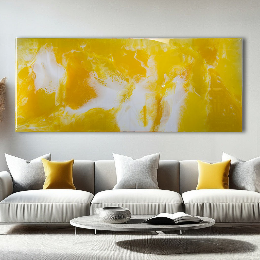 yellow and white glossy resin wall art, on a metal wall art base, over a modern sofa