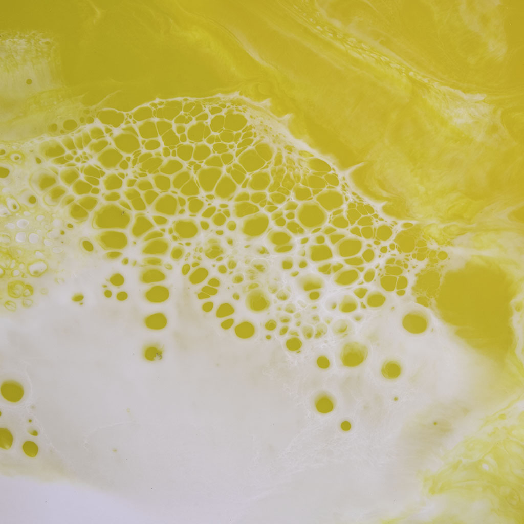 Yellow and white resin metal wall art closeup