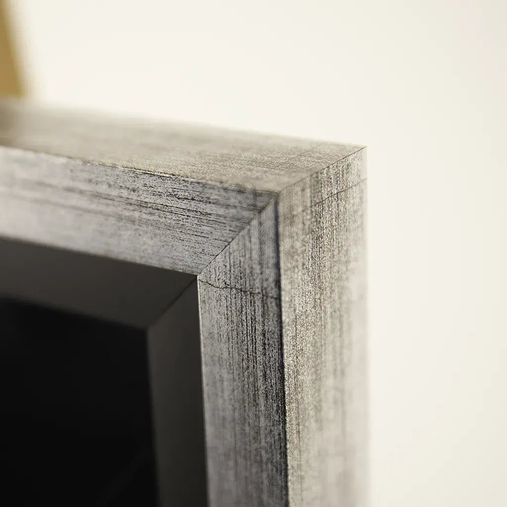 closeup frame view of Handmade wooden framed black and white wall art featuring London's St Paul's Cathedral and Millennium Bridge by Elysian Bespoke, luxury contemporary statement artwork for modern interiors.