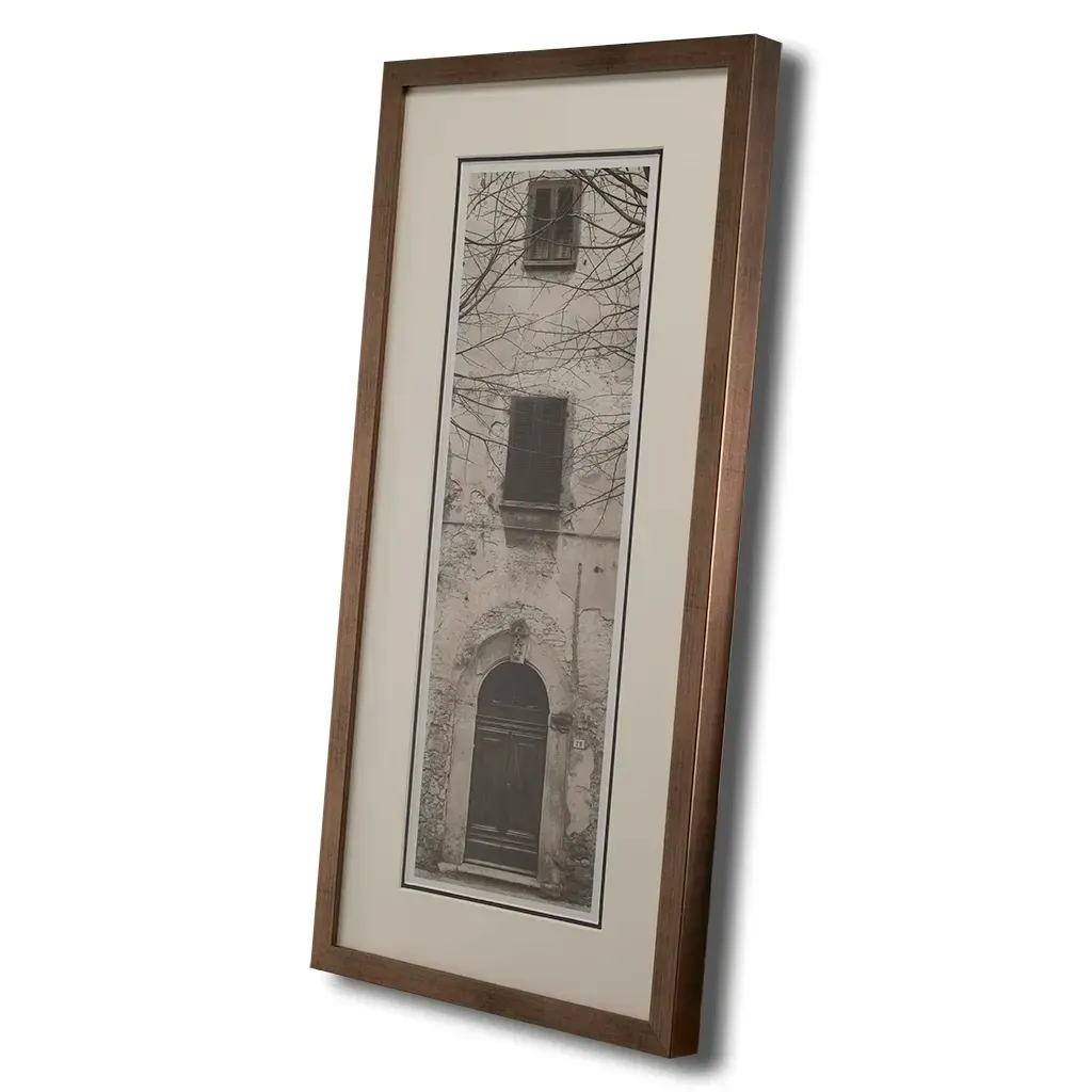 side profile of Bronze framed Italian stone archway wall art featuring a historic rustic wooden doorway in monochrome architectural photography. Handmade luxury framed artwork by Elysian Bespoke for contemporary home 