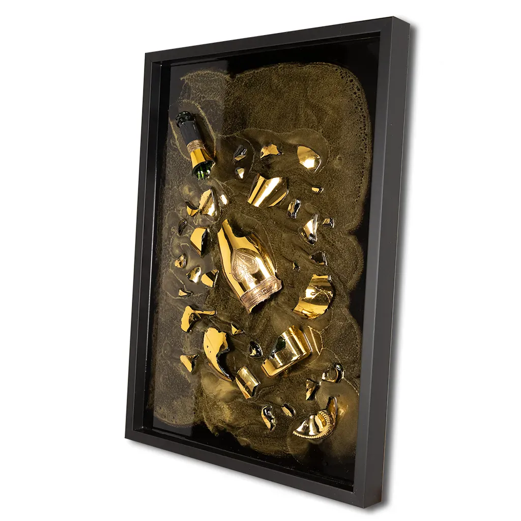left hand angled One-of-a-kind Armand de Brignac gold bottle and fragments set in textured metallic resin, handmade and framed by British artist Paul Marshall
