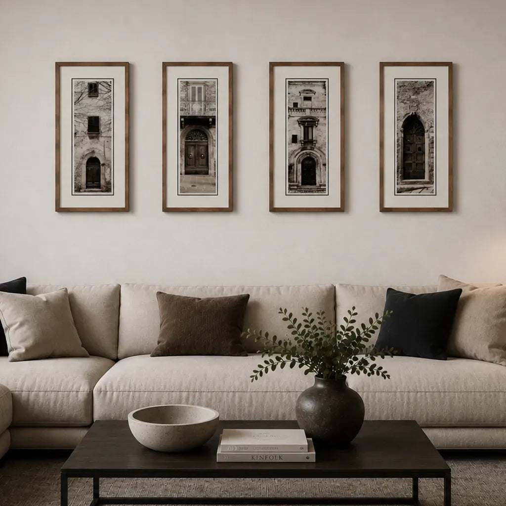 set of 4 Bronze framed Italian stone archway wall art featuring a historic rustic wooden doorway in monochrome architectural photography. Handmade luxury framed artwork by Elysian Bespoke for contemporary home 